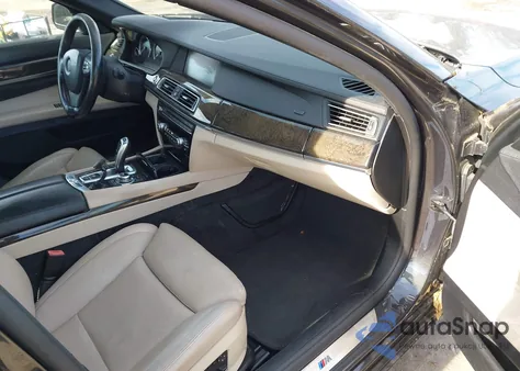 2011 BMW 750Li z USA, uszkodzony, nr VIN WBAKB8C54BCY66596